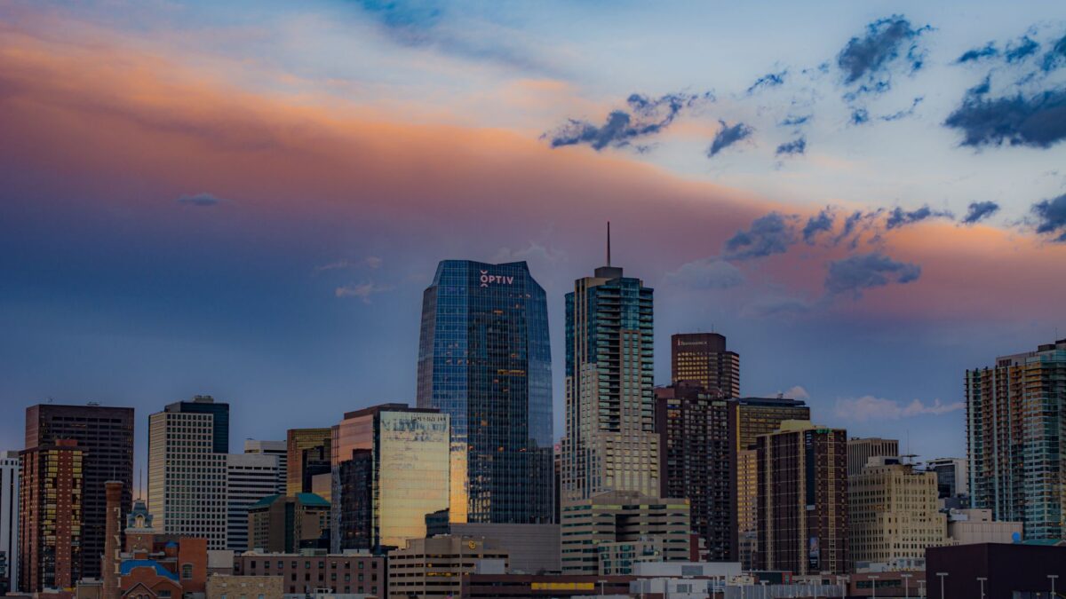 Denver, Colorado skyline at night with illuminated downtown buildings