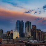 Denver, Colorado skyline at night with illuminated downtown buildings