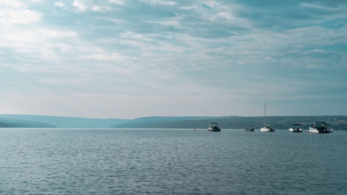 Boats on a calm Finger Lakes lake in upstate New York