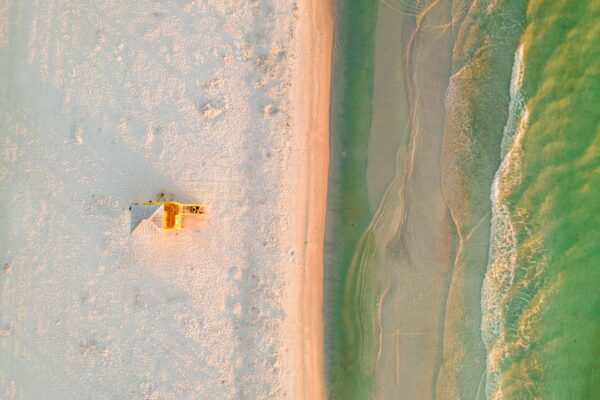Siesta Key beach with lifeguard tower and turquoise water, Sarasota Florida