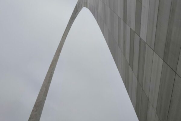 The Gateway Arch in St. Louis rising against the sky, featured image for the 2026 neighborhoods guide