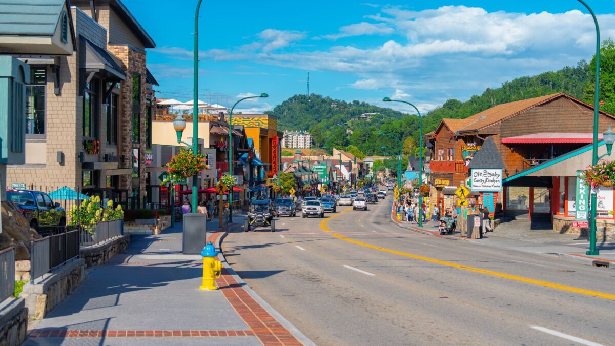 Small-town Tennessee street lined with historic buildings under a clear sky