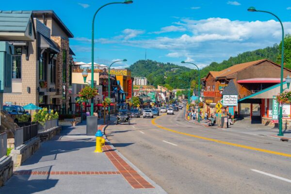 Small-town Tennessee street lined with historic buildings under a clear sky
